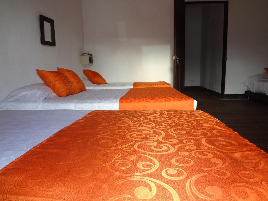 Raices Hotel San Agustin Habitación foto
